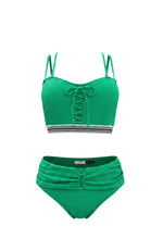 Bộ bikini cạp cao màu xanh ngọc bích của Women in Lov3, áo có dây buộc phía trước và quần cạp cao xếp ly.
